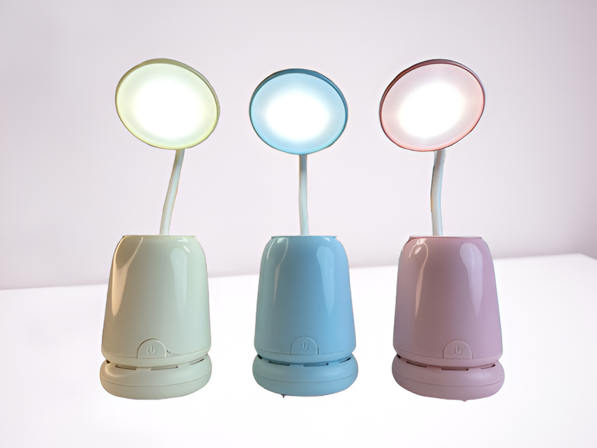 Table lamp with built-in table hoover