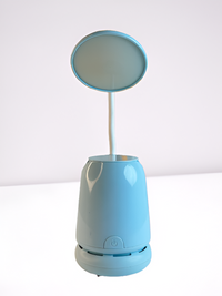 Table lamp with built-in table hoover