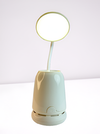 Table lamp with built-in table hoover